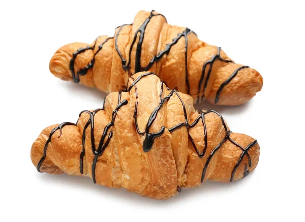 Leckere Croissants mit Schokoladensirup — Stockfoto