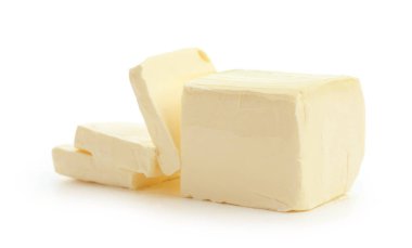 Beyaz arka planda lezzetli taze tereyağı