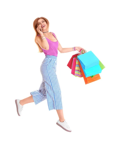 Young woman with shopping bags — Stock Photo, Image