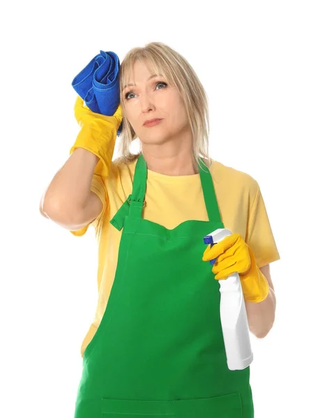 Tired mature woman with bottle of detergent and rag on white background — Stock Photo, Image