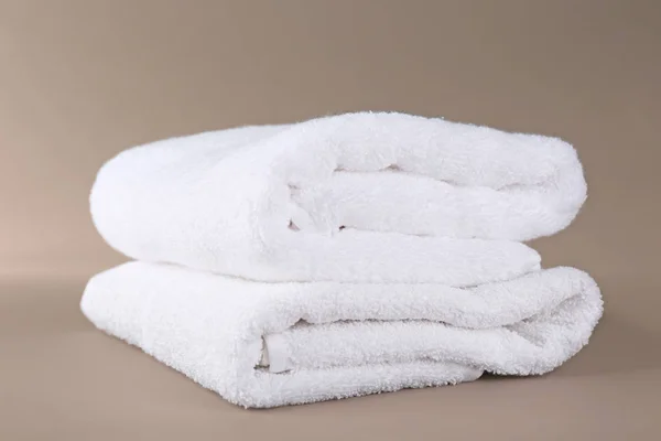 Soft terry towels on color background — Stock Photo, Image