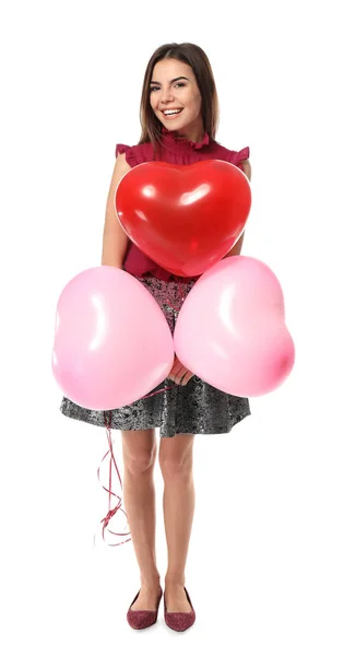 Giovane donna con palloncini a forma di cuore — Foto Stock