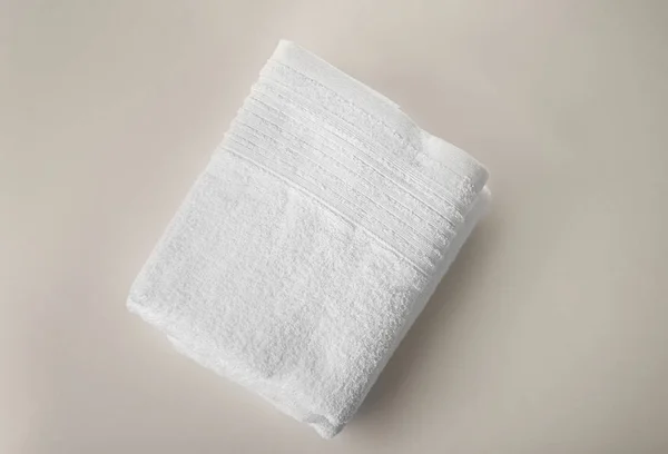 Soft terry towel on light background, top view — Stock Photo, Image