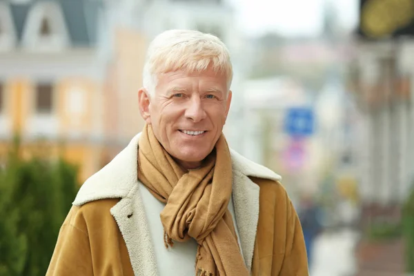 Portrait of handsome mature man outdoors — Stock Photo, Image