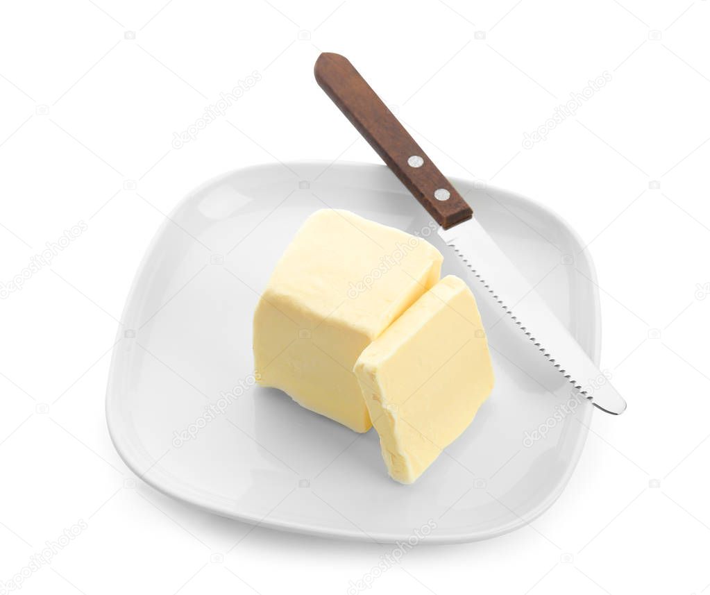 Plate with tasty fresh butter on white background