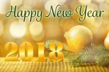 Mutlu yeni yıl 2018 köknar ağacı dalı ve Noel dekor bulanık ışıklar arka plan üzerinde mesaj