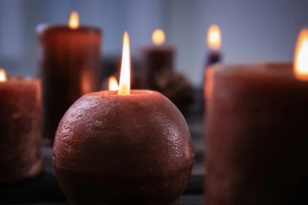 Burning candles on table, closeup — Stock Photo, Image