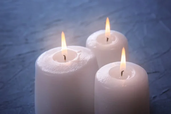 Burning candles on table, closeup — Stock Photo, Image