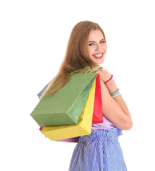 Jovem com sacos de compras — Fotografia de Stock