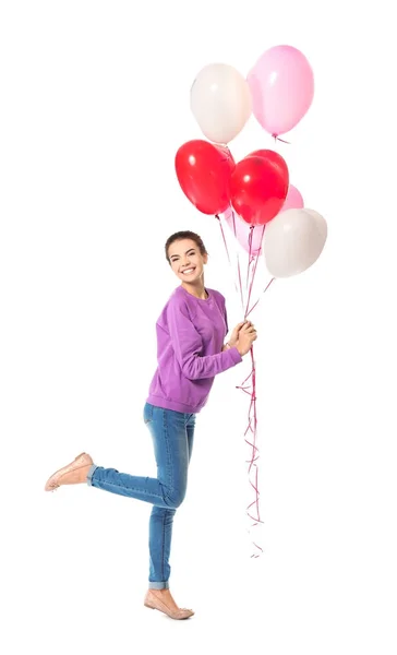 Młoda kobieta z balony w kształcie serca — Zdjęcie stockowe