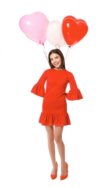 Young woman with heart-shaped balloons — Stock Photo, Image