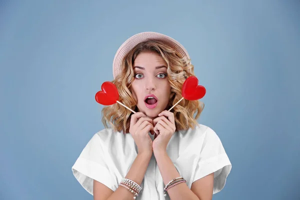 Young woman with lollipops — Stock Photo, Image