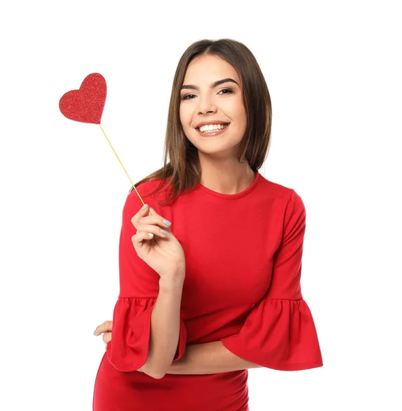 Romantische junge Frau mit Party-Dekor zum Valentinstag auf weißem Hintergrund — Stockfoto