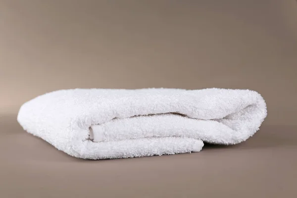 Soft terry towel on color background — Stock Photo, Image