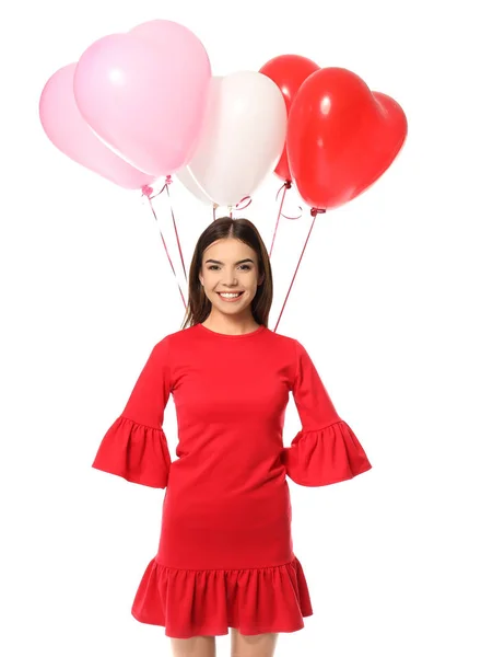 Giovane donna con palloncini a forma di cuore — Foto Stock