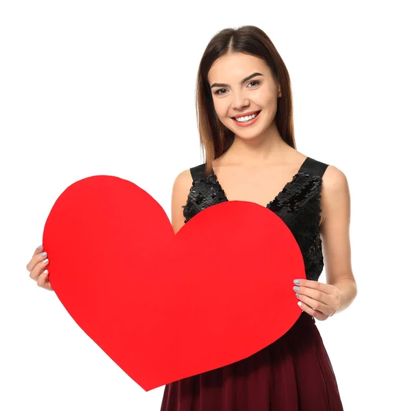 Romantic young woman with paper heart for Valentine's Day on white background — Stock Photo, Image