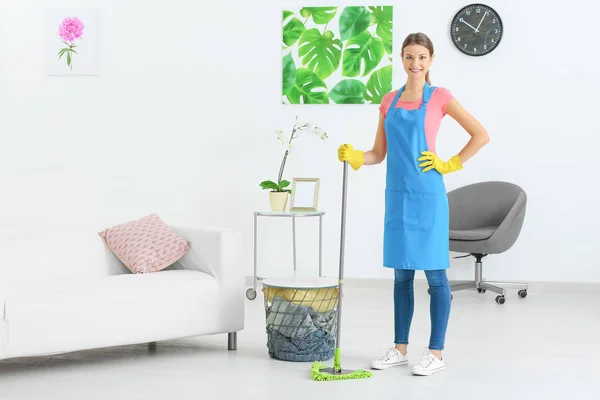 Young woman after cleaning flat — Stock Photo, Image