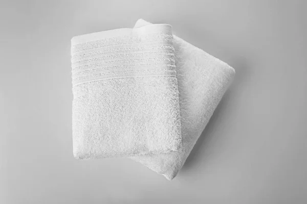 Soft terry towels on light background, top view — Stock Photo, Image