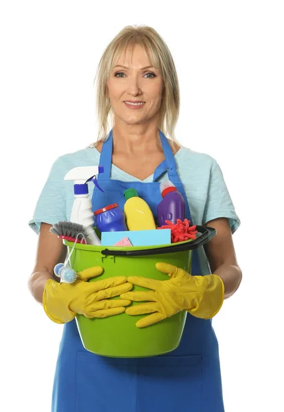 Mature woman with cleaning supplies on white background — Stock Photo, Image