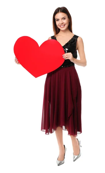 Romantic young woman with paper heart for Valentine's Day on white background — Stock Photo, Image