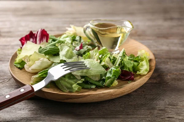 Plate of fresh salad on table — Stock Photo, Image