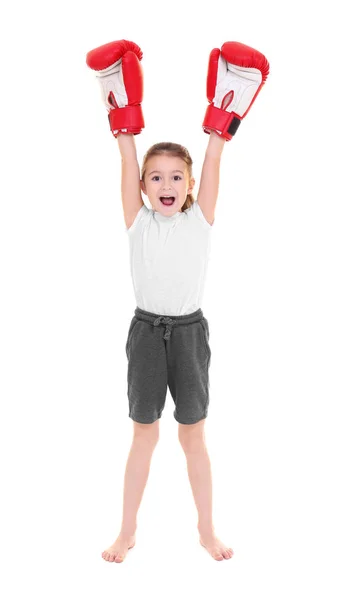 Schattig klein meisje in bokshandschoenen op witte achtergrond — Stockfoto