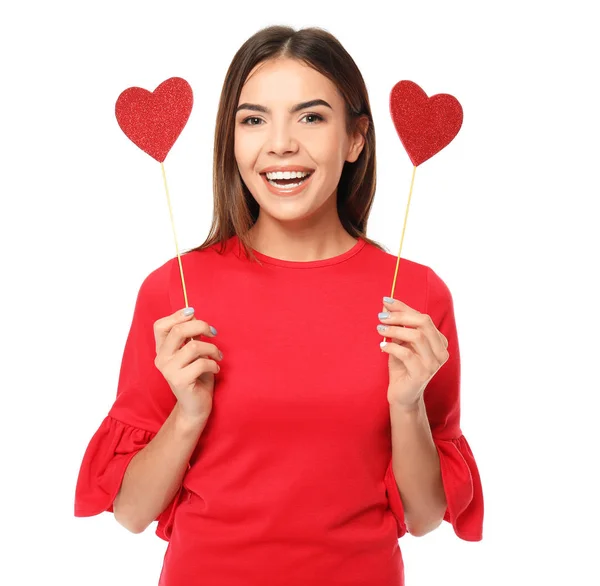 Romantische jonge vrouw met partij decor voor Valentijnsdag op witte achtergrond — Stockfoto