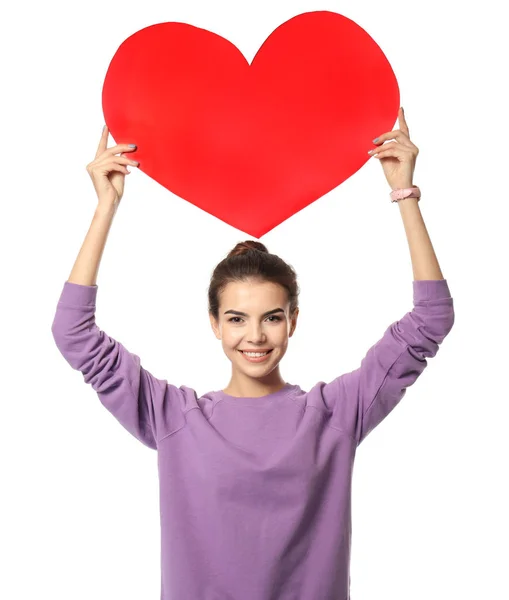 Romantic young woman with paper heart on white background — Stock Photo, Image