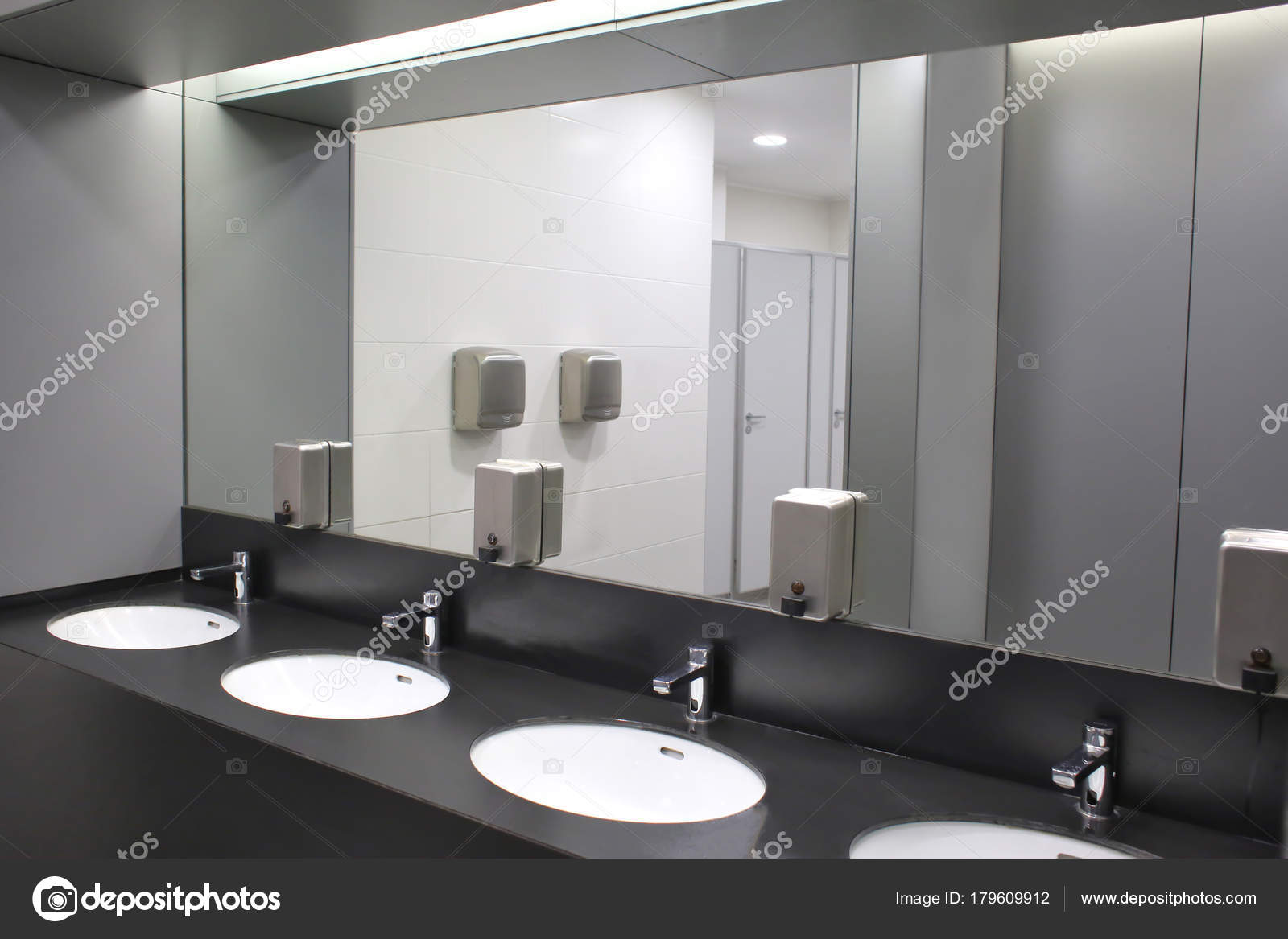Modern Sinks With Mirror In Public Toilet Stock Photo
