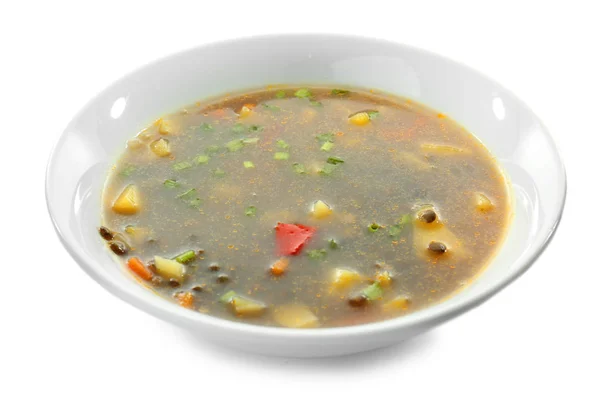 Placa con sabrosa sopa de lentejas sobre fondo blanco — Foto de Stock