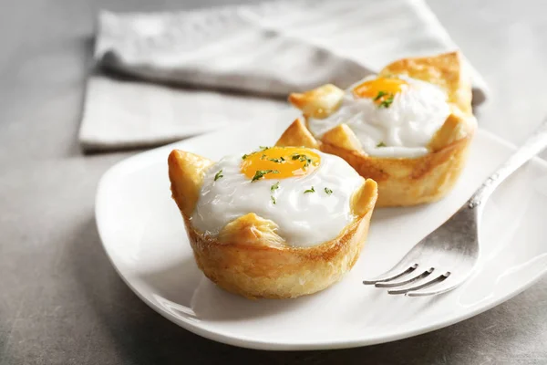 Baked eggs in dough — Stock Photo, Image