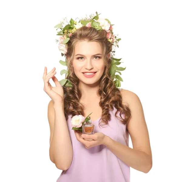 Young woman with bottle of perfume — Stock Photo, Image