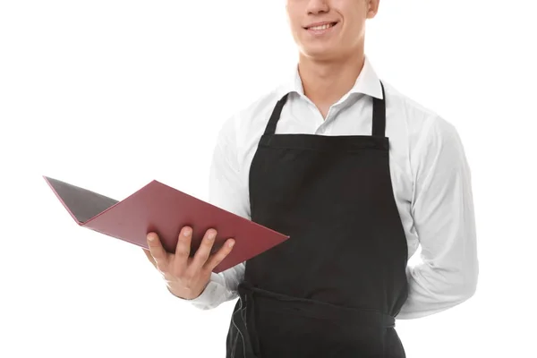 Bello giovane cameriere con menu su sfondo bianco — Foto Stock