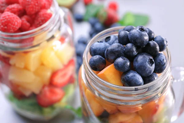 Jar with fruits and berries — Stock Photo, Image