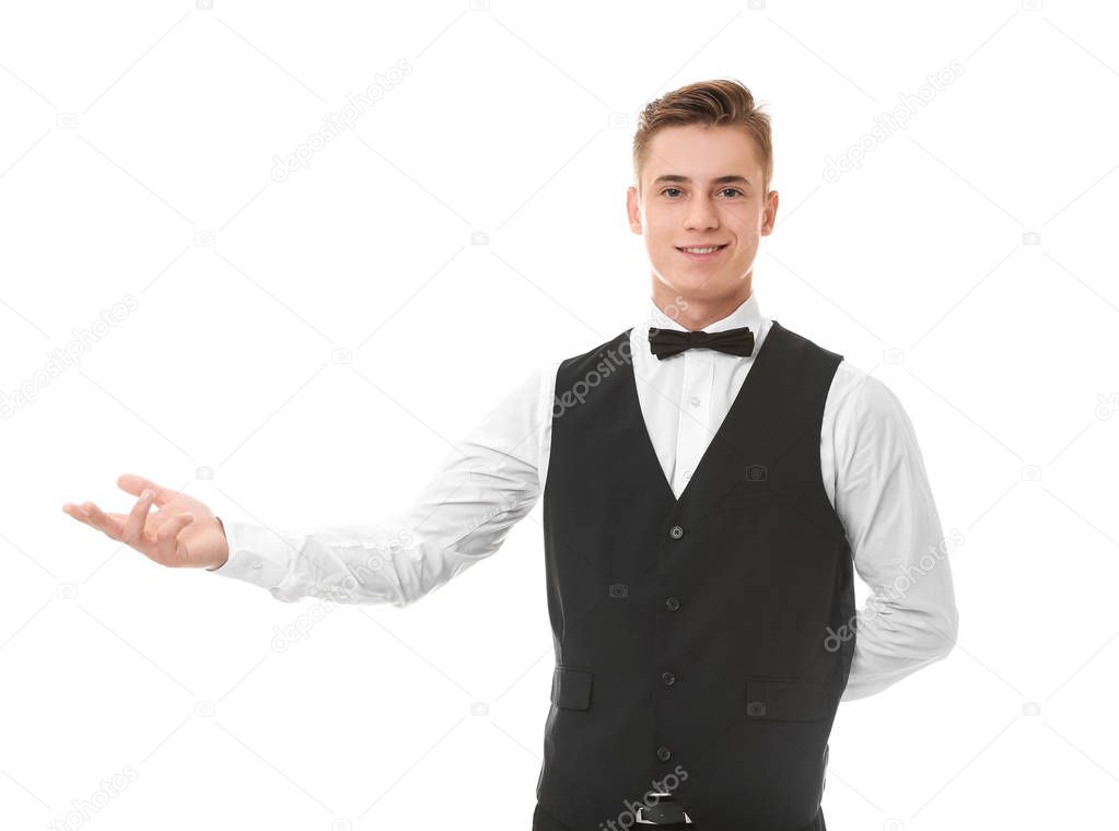 Handsome young waiter on white background