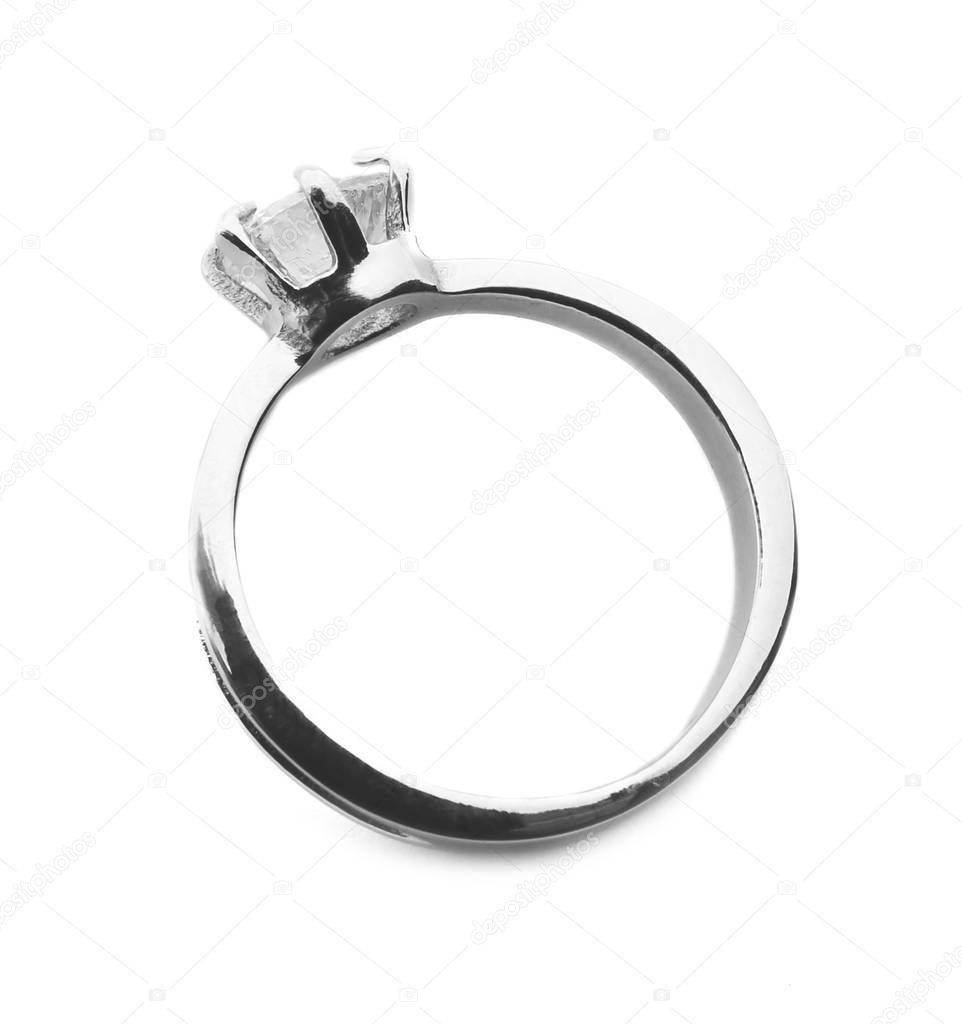 Luxury engagement ring with diamond on light background
