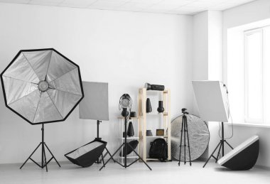 Professional equipment in modern photo studio clipart
