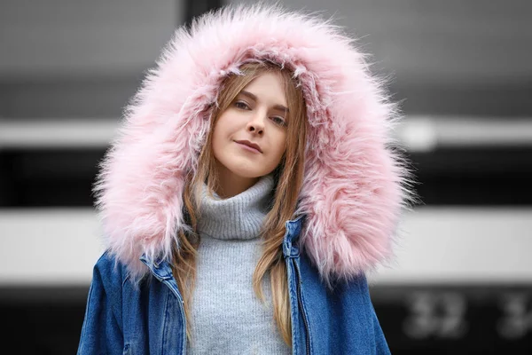 Attractive hipster girl in warm jacket outdoors — Stock Photo, Image