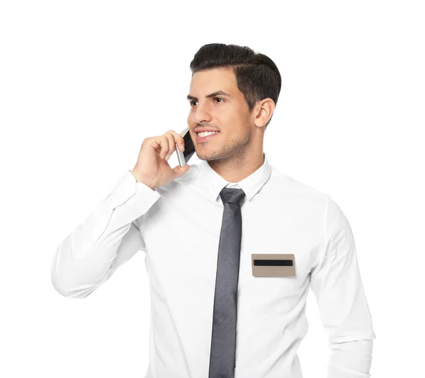 Man in formal clothes talking on phone against white background — Stock Photo, Image