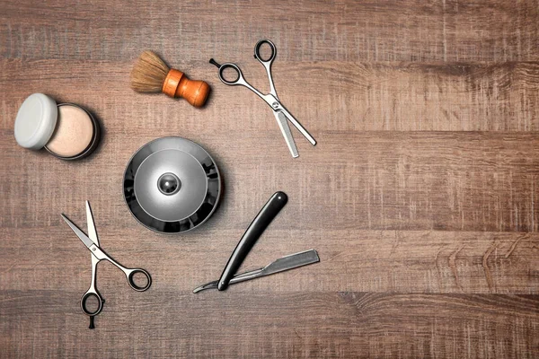 Professional hairdresser set for men on wooden table