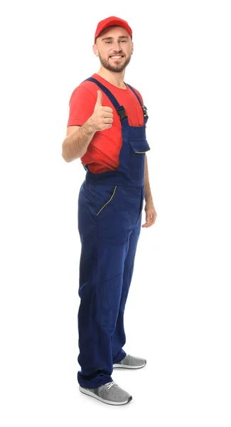 Handsome auto mechanic showing thumb-up gesture on white background — Stock Photo, Image