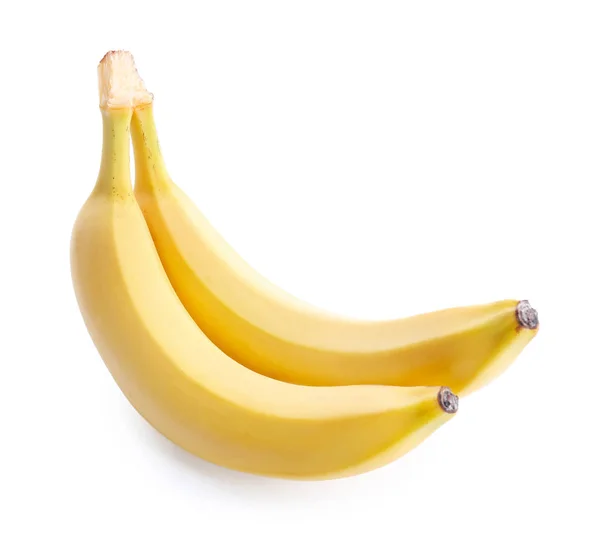 Chutné zralé banány na bílém pozadí — Stock fotografie