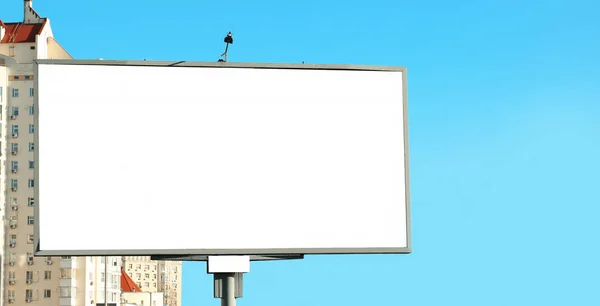 Blank advertising board on city street — Stock Photo, Image
