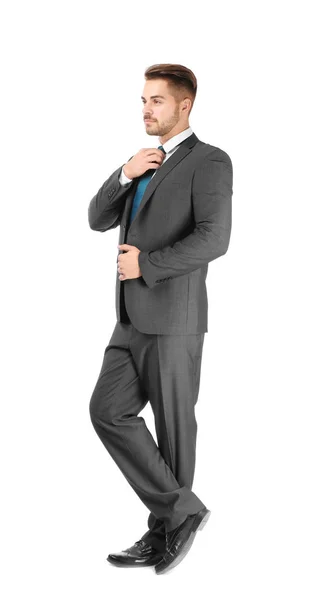 Knappe man in formele pak op witte achtergrond — Stockfoto