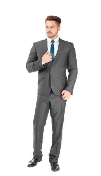 Knappe man in formele pak op witte achtergrond — Stockfoto