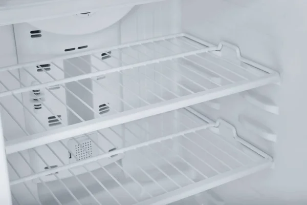 Empty refrigerator shelves, closeup — Stock Photo, Image