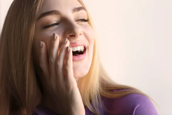 Smiling Woman Violet Sweatshirt Light Background — Stock Photo, Image