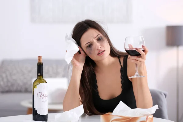 Depressed young woman crying at home — Stock Photo, Image