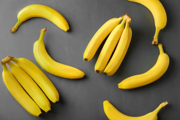 Tasty Ripe Bananas Grey Background — Stock Photo, Image