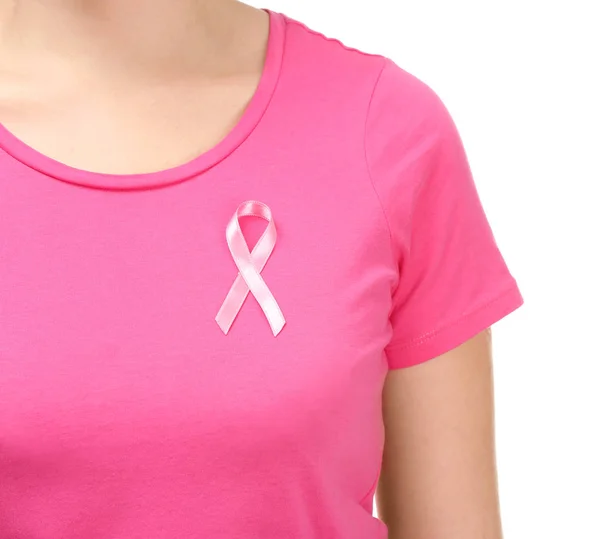 Woman with pink ribbon on t-shirt against white background. Breast cancer awareness concept — Stock Photo, Image